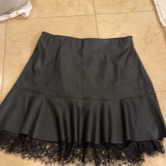 bebe Dresses & Skirts - Bebe Leather Like Skirt with lace under lay. - Size L